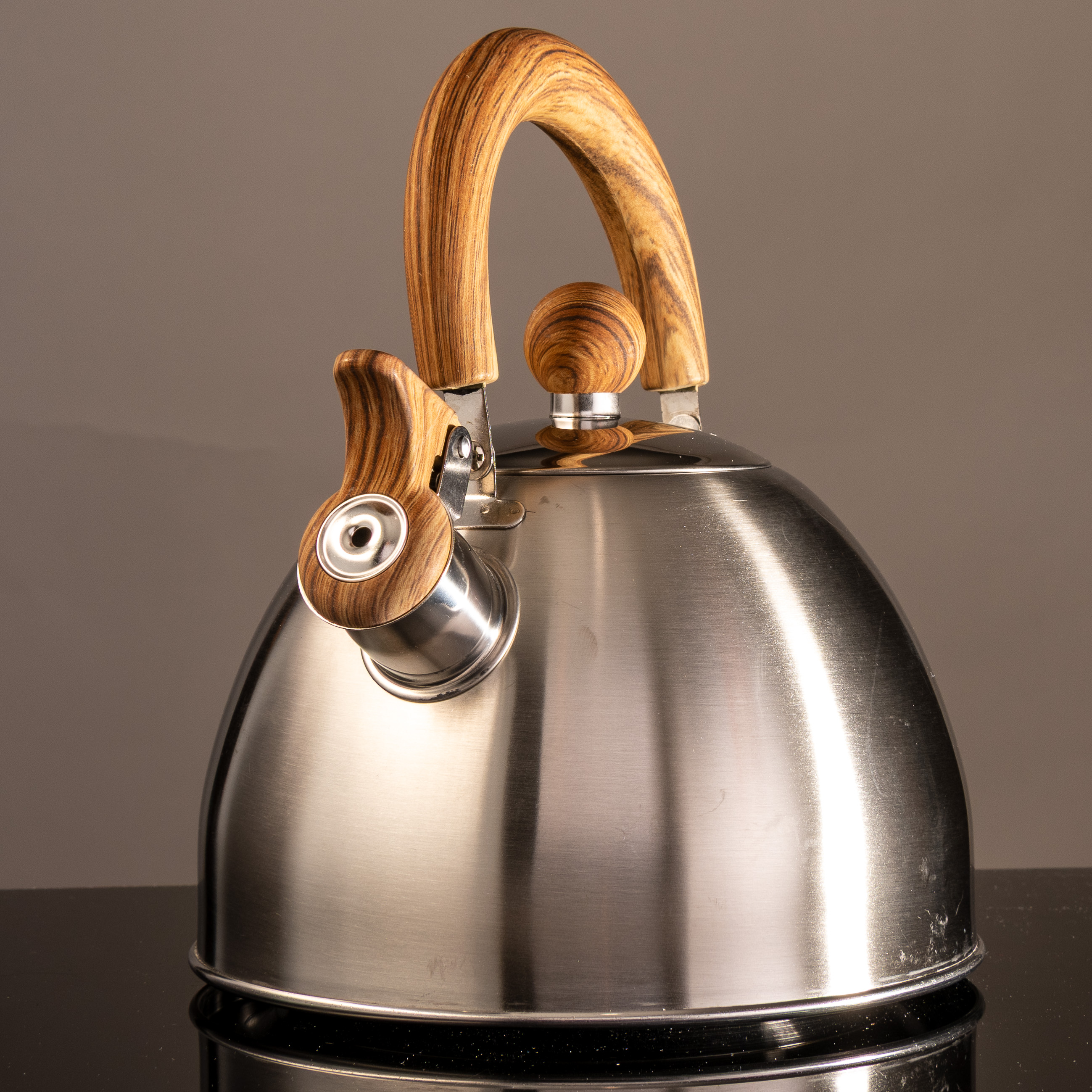 Tea kettle on non-white background - shot in studio Image