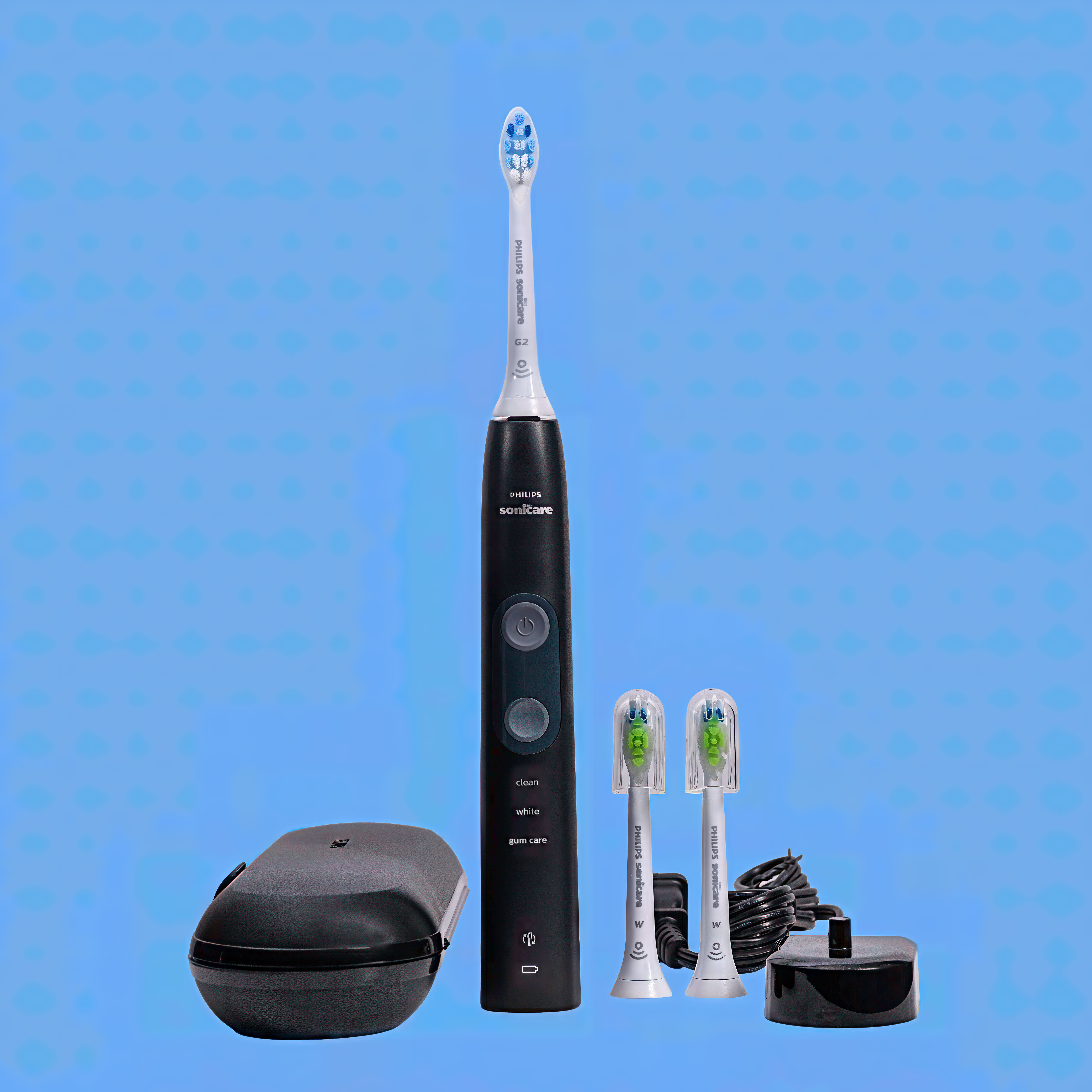 Electric toothbrush on non-white - shot in studio Image