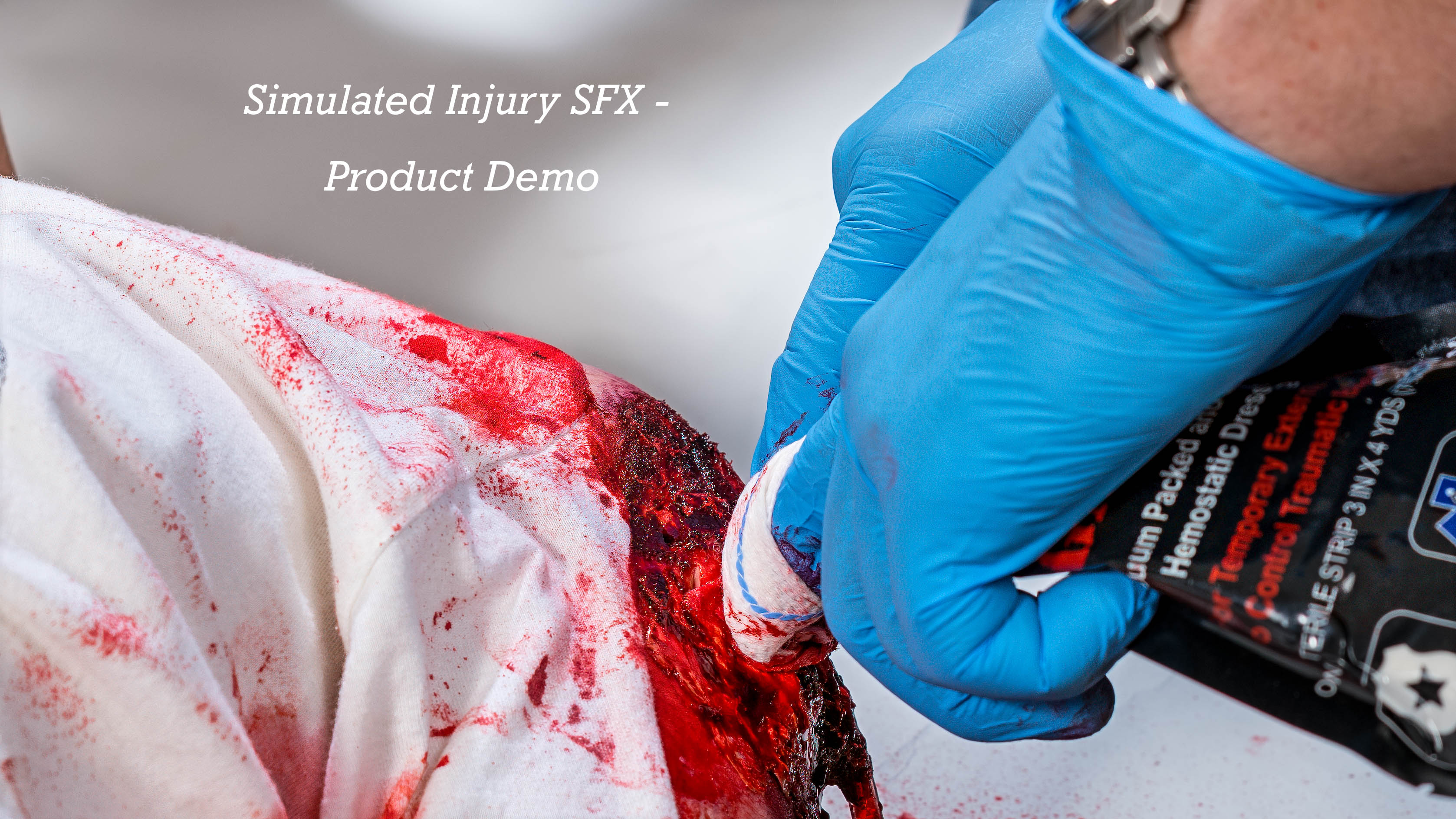 SFX Depicting Quick Clot Hemostatic Dressing Application in Studio with 2 Models SFX Depicting Quick Clot Hemostatic Dressing Application in Studio with 2 Models